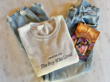 The Boy Who Lived Embroidered Sweatshirt – Wizard Bookish Crewneck